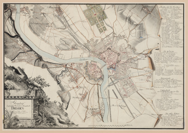 Ein detaillierter alter Stadtplan von Dresden, Deutschland, der Straßen, Gebäude und Sehenswürdigkeiten zeigt.