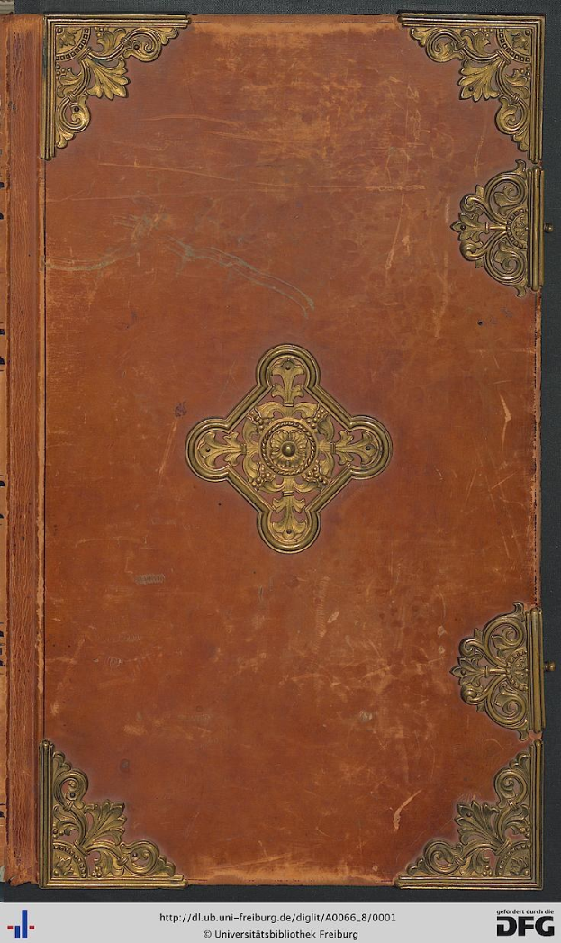 Old book with a brown cover and gold trim, labeled "universitätsbibliothek freiburg," on a black background.