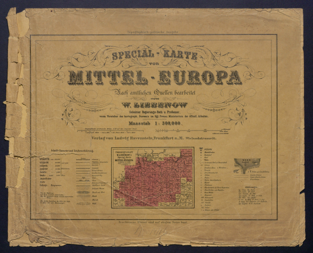 Old book with a detailed map of Mittel-Europa, including cities and towns, on a dark background.