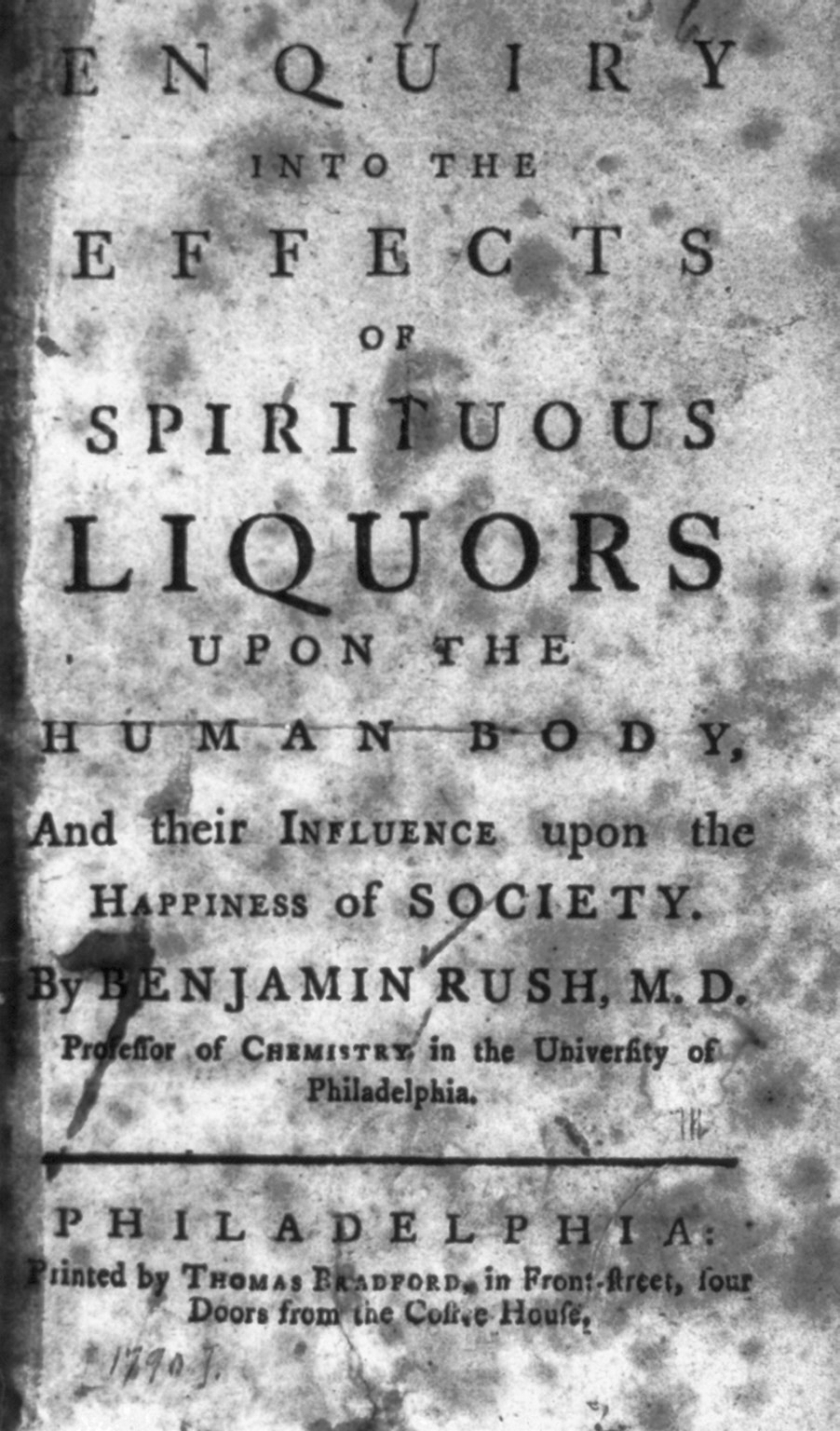 Old book titled "Enquiry into the Effects of Spiritual Liquors Upon the Human Body and Their Influence Upon the Happiness of Society."