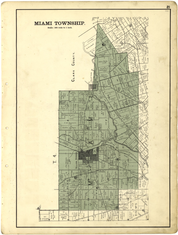 Top-down view of an old detailed map of Miami, Florida, with text at the top and bottom, showing streets, buildings, and landmarks.