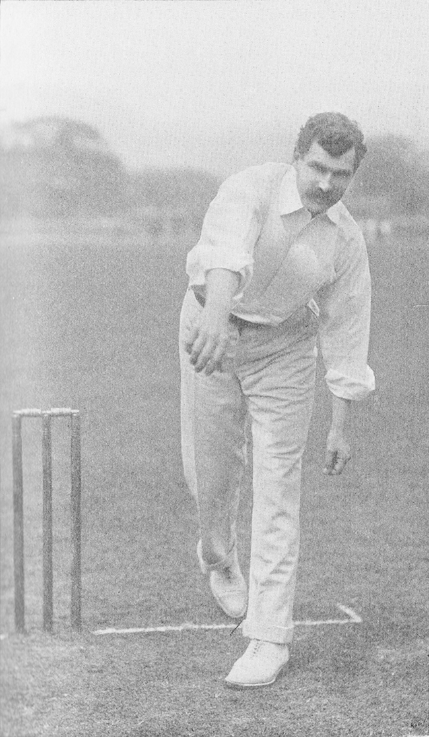 Ein Mann in einem weißen Cricket-Outfit spielt auf einem Feld mit Wickets, Bäumen und Himmel im Hintergrund; Text unten lautet "Cricket-Spieler des Jahres".