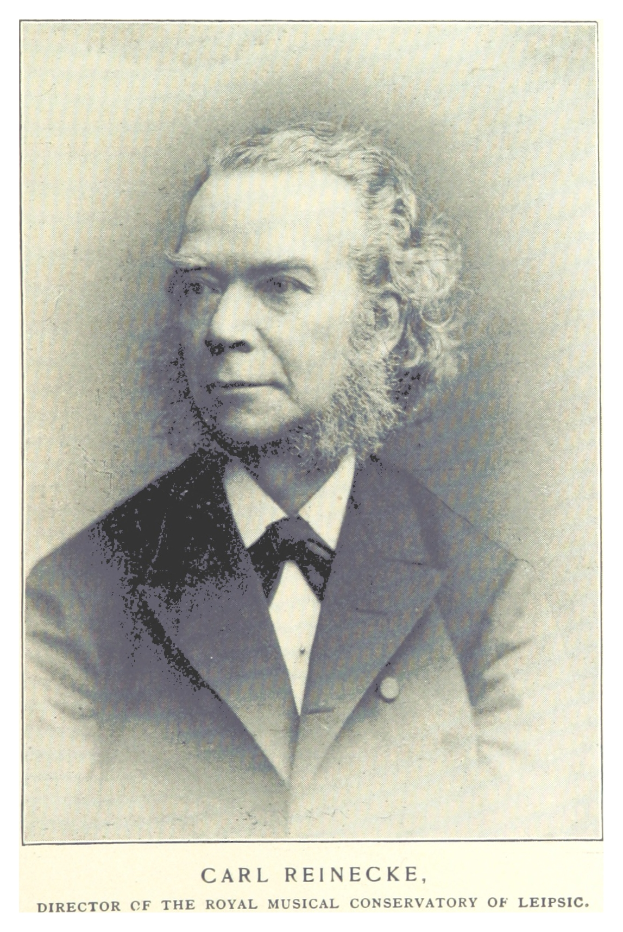 Schwarzes und weißes Porträt von Carl Reinecke, Direktor des Königlichen Musik-Konservatoriums von Leipzig, der einen Anzug trägt, mit Text unten im Bild.