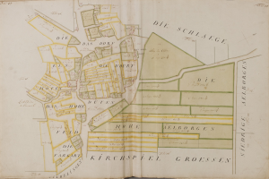 An old book featuring a detailed map of Hamburg, Germany, with visible text about the city's population, streets, and landmarks.