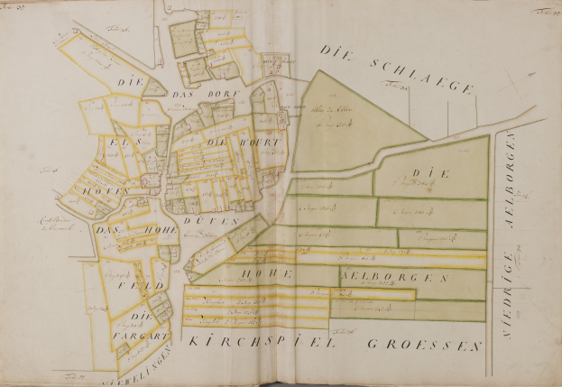 An old book featuring a detailed map of Hamburg, Germany, with visible text about the city's population, streets, and landmarks.