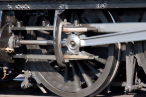 Eine Nahaufnahme eines Zugrades, das die Lauffläche und den Flansch zeigt.