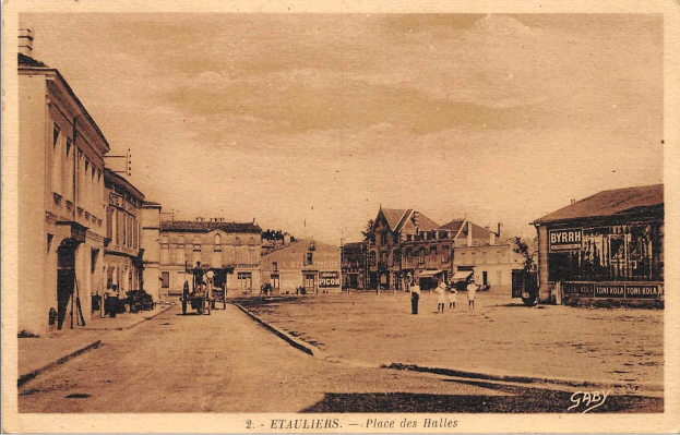 Black and white photo of a city street with buildings, people, carts, poles, trees, and a sky, labeled "Place des Halles" at the bottom.