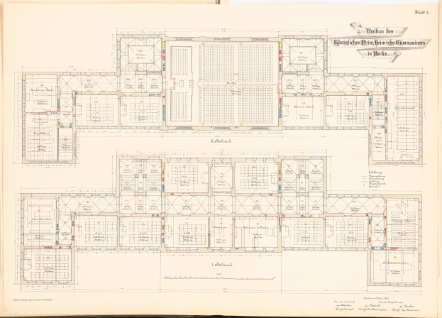 Open book displaying a detailed floor plan of the Berlin Olympic Gymnasium with accompanying text.