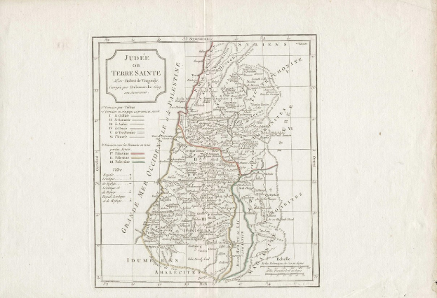 An old book featuring a detailed map of Israel with provinces, cities, and accompanying text.
