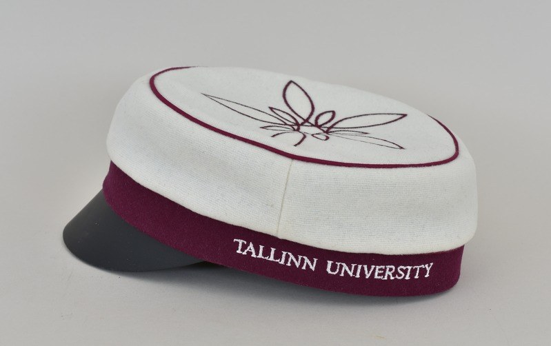 A white and maroon cap with "Tallinn University" printed on it against a white background.