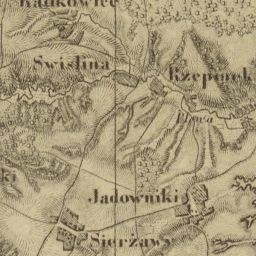 Old detailed map of Jadowniki showing streets, buildings, and landmarks with additional text information.