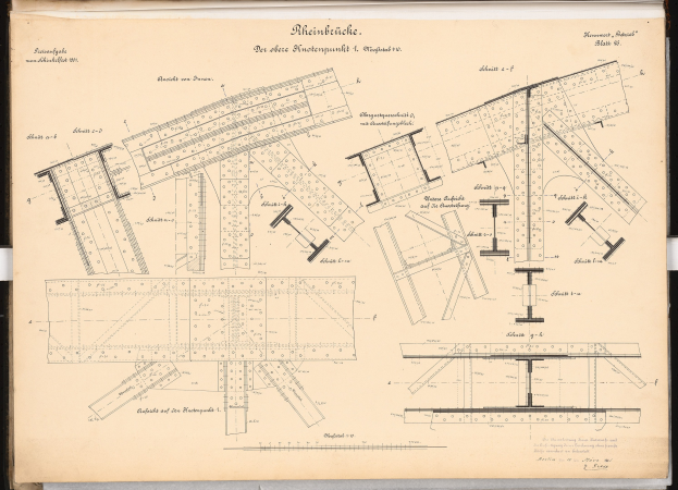 Open book displaying detailed plans and text with a drawing of a table on one page.