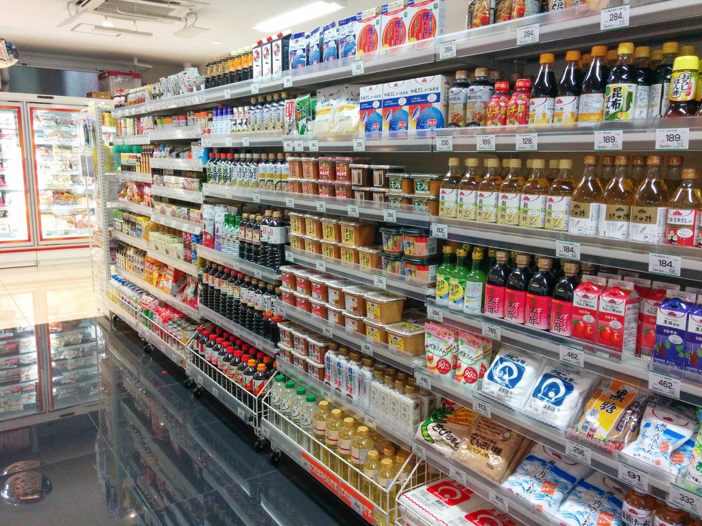 A supermarket aisle displaying various groceries.