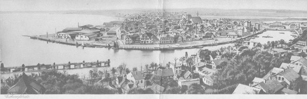 Ein altes Schwarz-Weiß-Foto von Eckenhofeld, Deutschland aus dem Jahr 1885, das zahlreiche Gebäude, Bäume und eine Brücke über einen Gewässer zeigt.